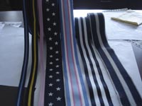 ���]����